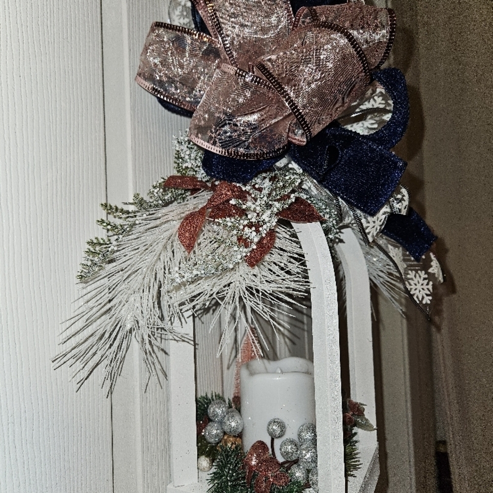 Elegant White Holiday Lantern with Candle and Festive Decorations